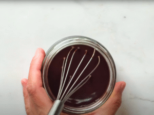 Add Nesquik – Stir in Nesquik powder until fully dissolved and smooth.