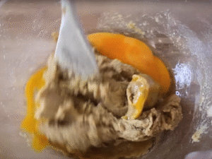 Mix in the egg and vanilla extract until smooth and fully combined.