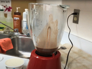 Carefully transfer half of the hot mixture to a blender. Remove the center insert from the lid and cover with a towel to release steam safely. Add the cream cheese and blend until silky.