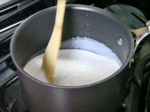 Heat the Milk Warm 2 cups of whole milk in the saucepan over medium‑low heat until steaming (about 150°F 65°C). Do not boil.