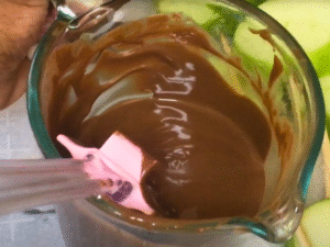 Warm chocolate in a microwave or double boiler until smooth.